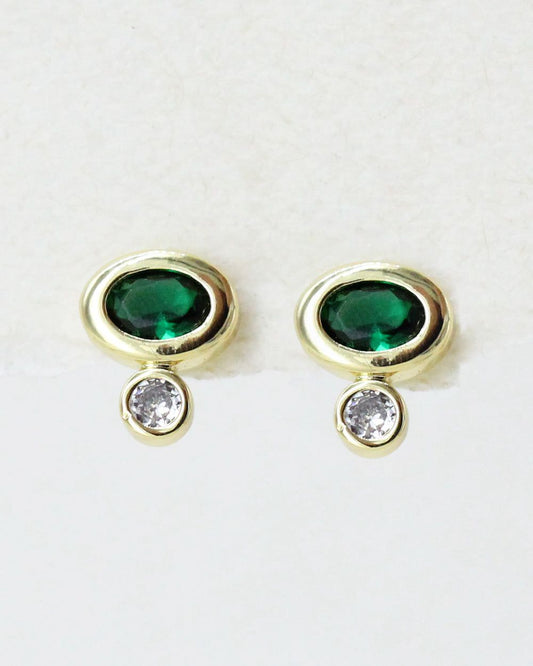 Gold stud earrings with green zirconia gemstones on a white background