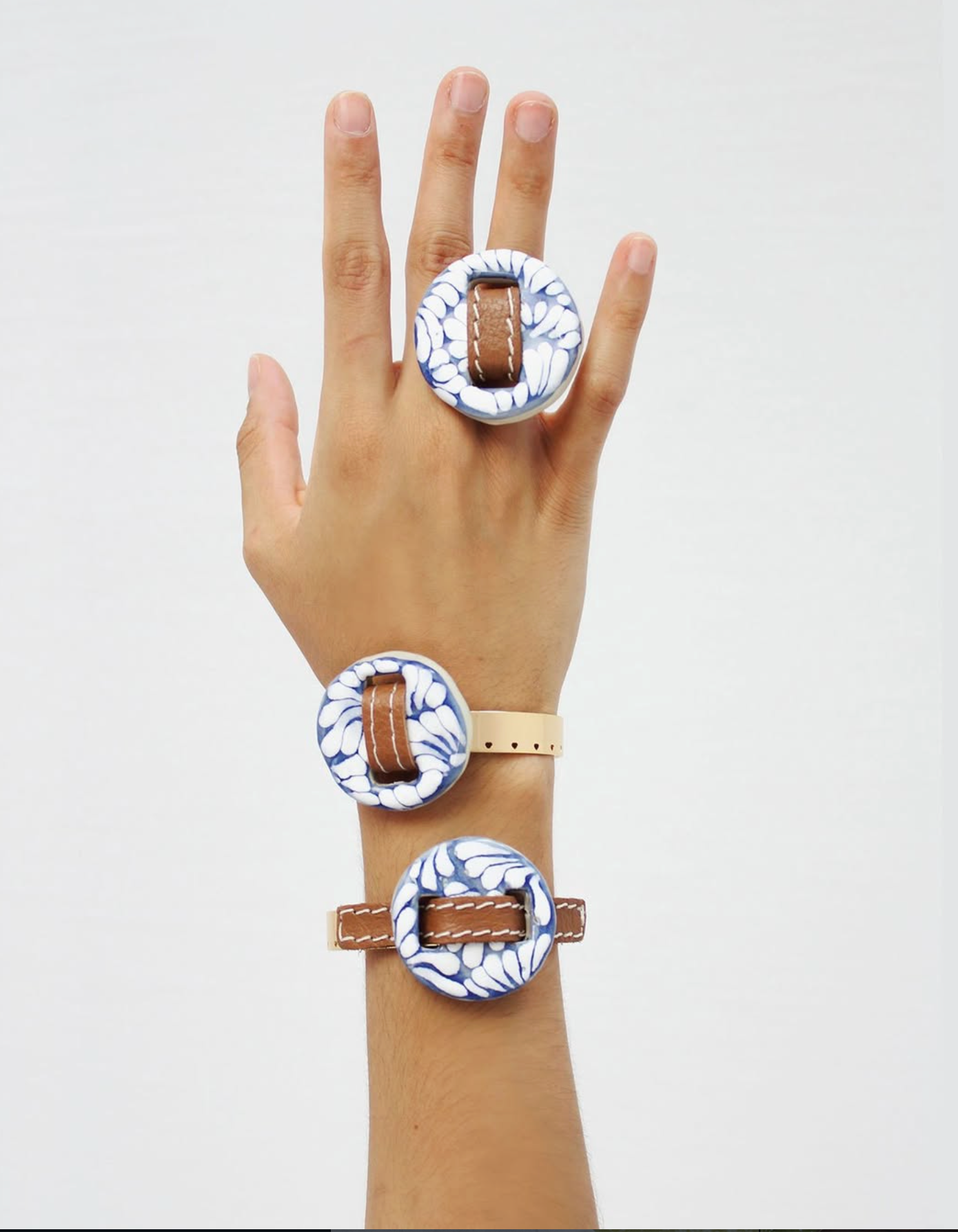Woman wearing a floral necklace and earrings on a white background
